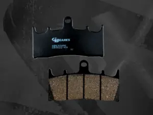 Close-up of GBrakes Harley-Davidson brake pads featuring Nucap NRS mechanical bonding technology for maximum braking strength and durability.